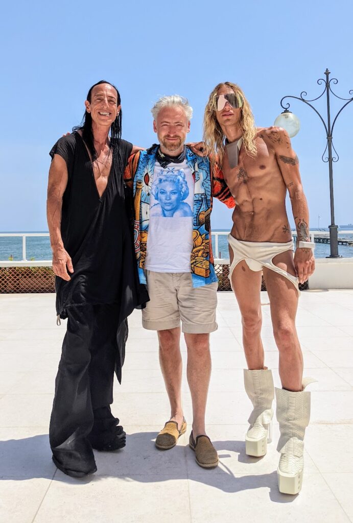 Luke Leitch with Rick Owens, left, and Tyrone Dylan Susman at the Rick Owens show on the Venice Lido; June, 2021